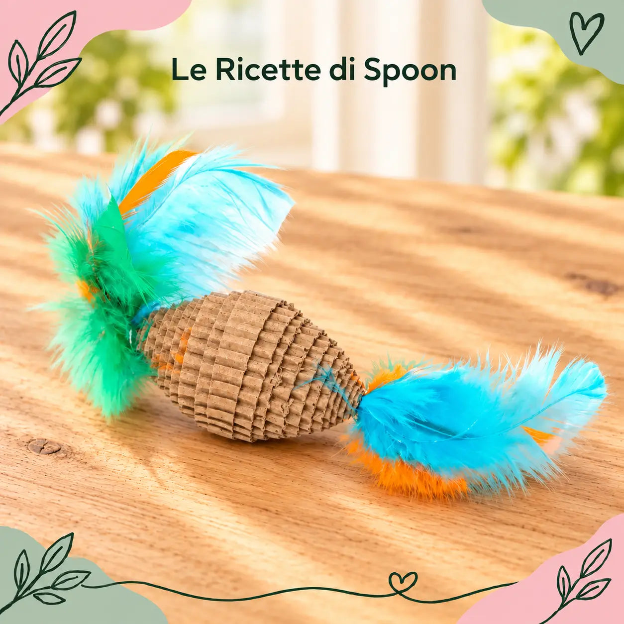 Mini palla ovale in cartone con piume | Le Ricette di Spoon | immagine principale con testo lineare